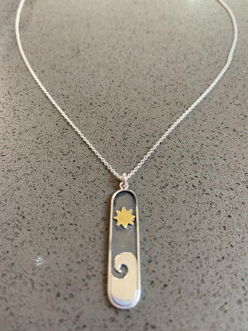 Sterling Silver Nature Inspired Necklace: Star and Wave Pendant
