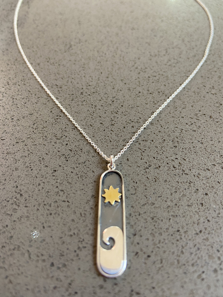 Sterling Silver Nature Inspired Necklace: Star and Wave Pendant